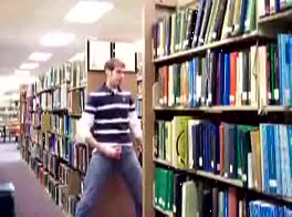 boy jerks off in the library